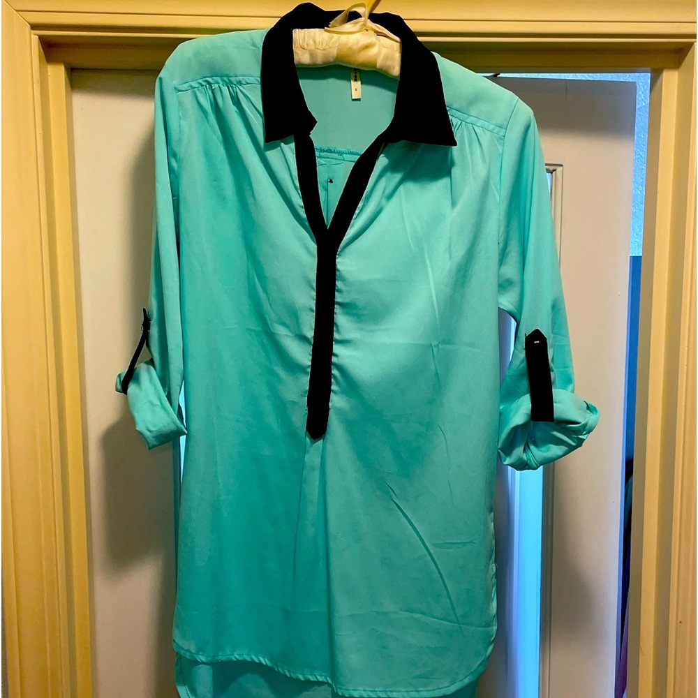 Pretty blouse mint green and black.  Super cute over black jeans/skinny jeans.